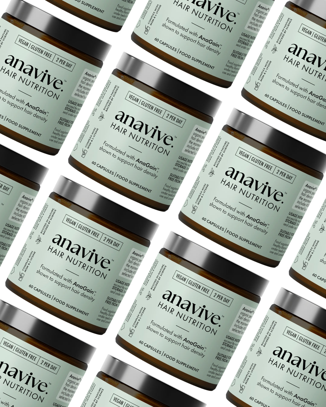 Multiple jars of anavive Hair Nutrition vitamin supplement arranged in a pattern.